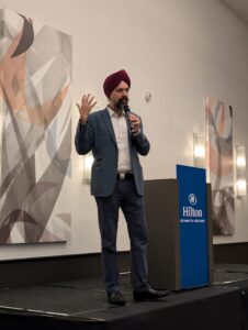 MP Tan Dhesi speaks to attendees after dinner.