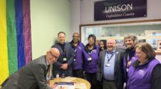 Martin Reeves, Chief Exec at Oxfordshire County Council signs the charter with UNISON activists from Oxfordshire County Branch