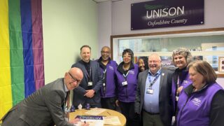 Martin Reeves, Chief Exec at Oxfordshire County Council signs the charter with UNISON activists from Oxfordshire County Branch