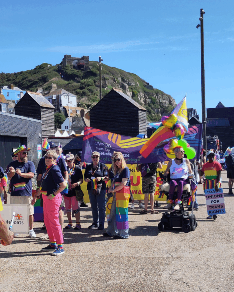 UNISON activists stand with the Pride parade ready to march through Hastings