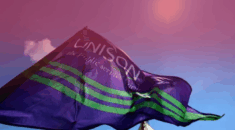 A UNISON flag waves in the wind
