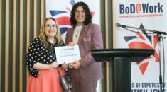 Susy receiving her award