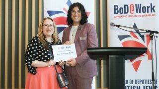 Susy receiving her award