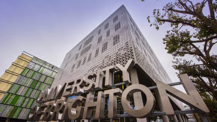 Frontage of a tall building at the campus of the University of Brighton